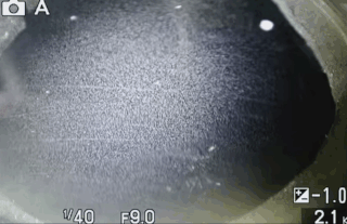 Vapour jets rising through liquid in a pint glass, seeded by collisions with charged particles